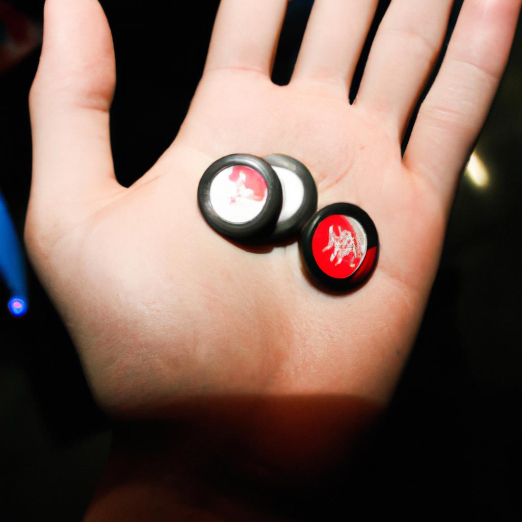 Person holding arcade game tokens